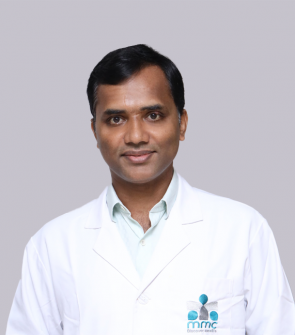 Dr. Aneesh M M